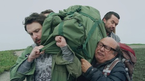 The Gang Carries a Corpse Up a Mountain
