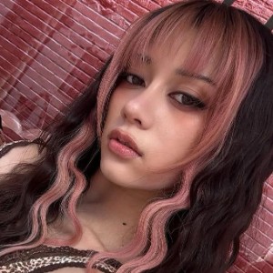 black and pink curly hair