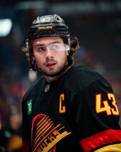 quitter/quinn hughes