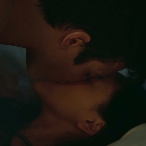 Tender kisses in bed
