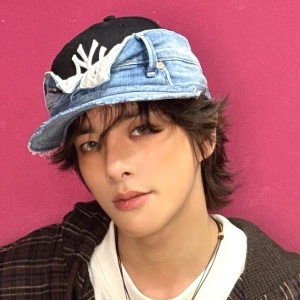brown hair in a cap