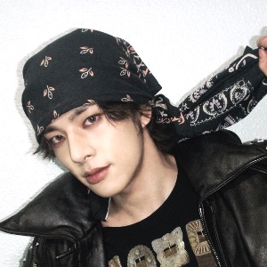 dark brown hair with bandana