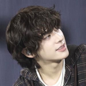 long dark brown fluffy hair with bangs