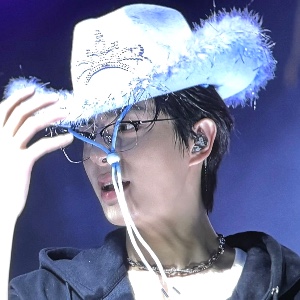 short black hair in cowboy hat