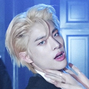 slicked back blonde hair