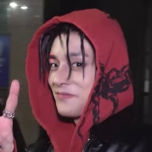 twisted black haired bangs with hood