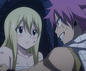 Lucy giving Natsu idea against Rogue
