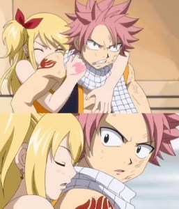 Lucy stopping Natsu from fighting