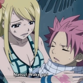Lucy holding unconscious Natsu