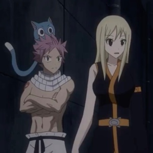 Lucy wearing Natsu’s clothes