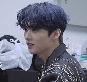 curly dark blue