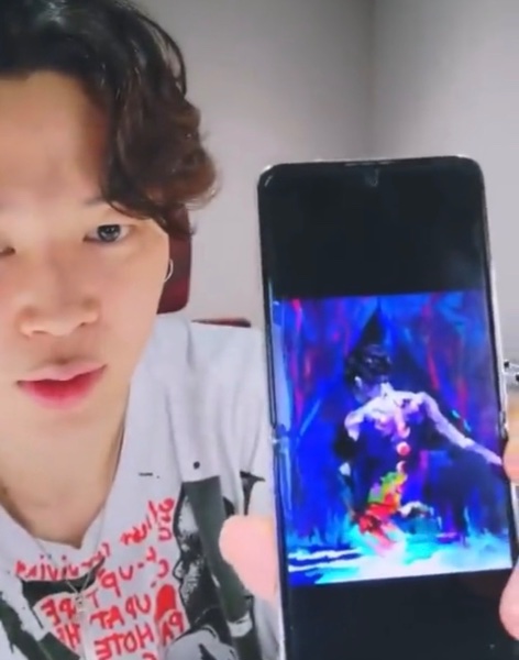th sending jm a fanart of him with moon tattoos saying that it’s pretty and jm getting it tattooed