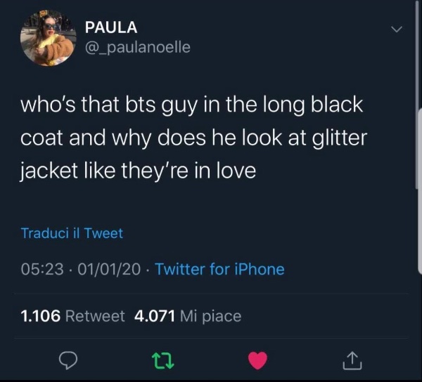 who's that guy in the long black coat and why does he look at glitter jacket like they're in love