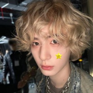 Curly blonde hair