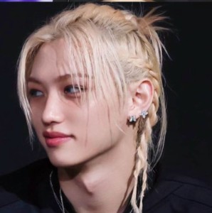 Felix whit braids