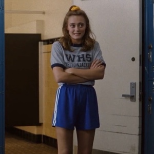 team shirt & blue shorts