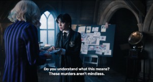 Telling Enid about the victims' dismemberments