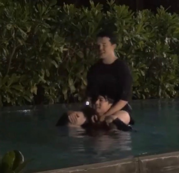 jungkook carrying jimin in the pool