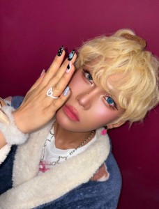 Fluffy blond with cute hairtye