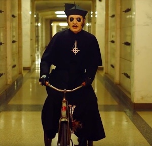 Black cassock with biretta