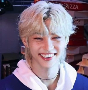 felix - short fluffy blonde