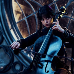 Wednesday playing Cello and Enid Dancing